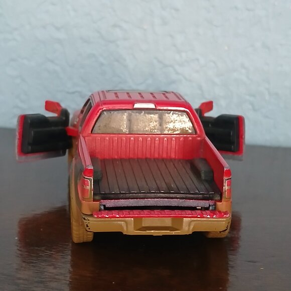 FORD F-150 SVT RAPTOR MUDDY RED METAL MODEL KINSMART PULL & GO - Picture 6 of 8